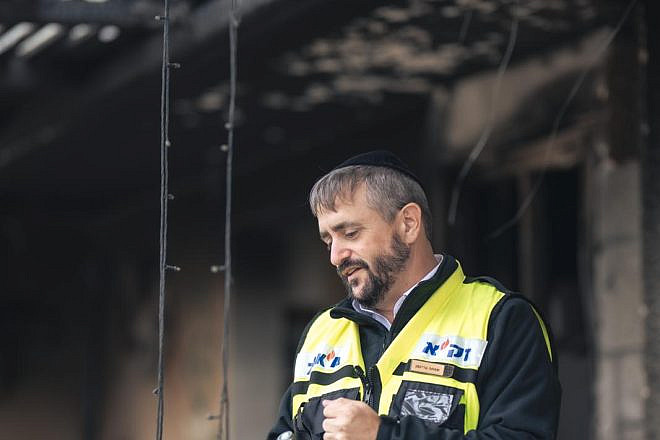 ZAKA volunteer Simcha Greiniman at the site of Hamas's Oct. 7 massacre. Photo courtesy of Simcha Greiniman.