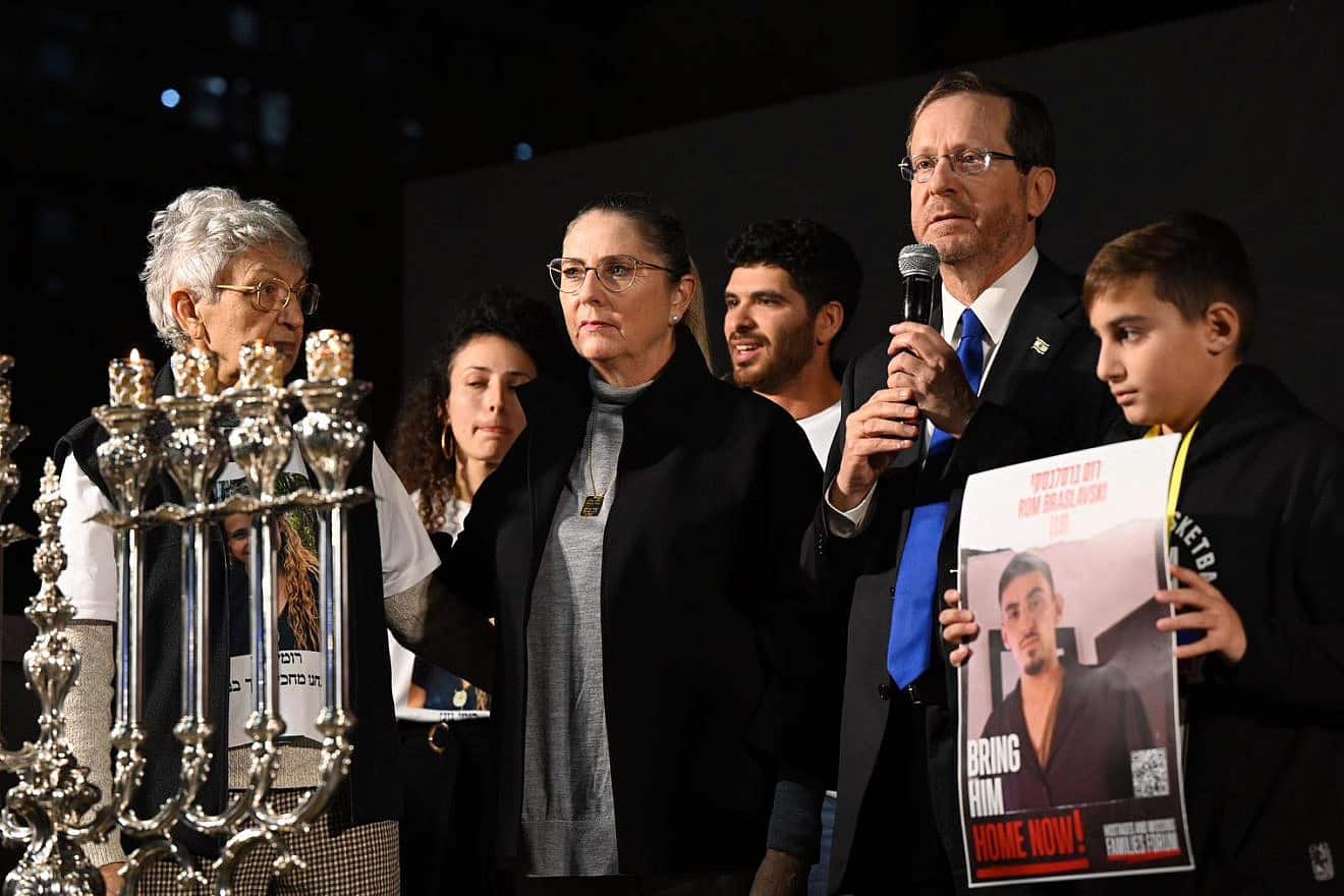 Israeli President Isaac Herzog lights Chanukah candles at “Hostage Square” in Tel Aviv, Dec. 14, 2023. Photo by Haim Zach/GPO.