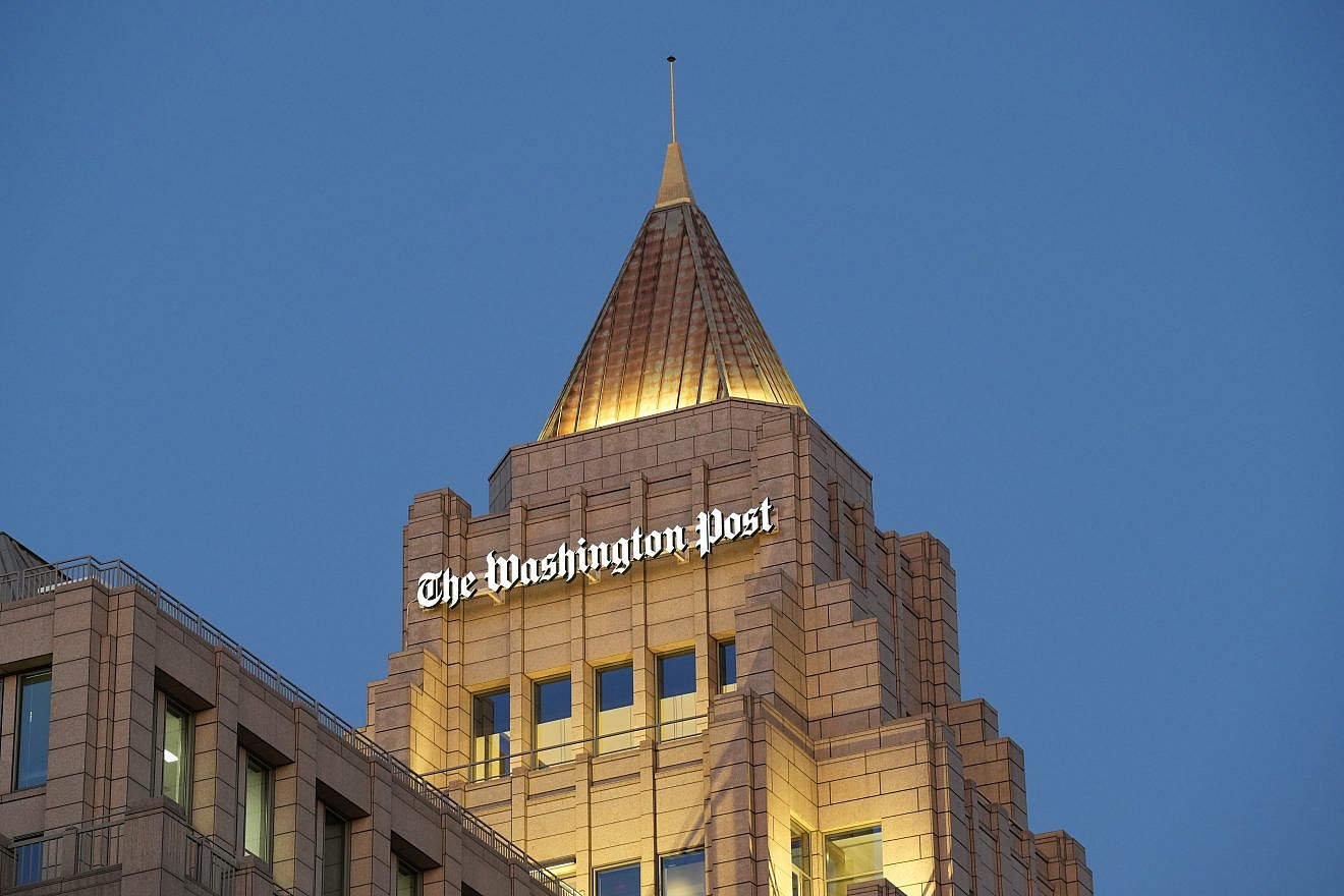 The sign atop “The Washington Post” building at night., Ja. 27, 2023. Credit: Phil Pasquini/Shutterstock.