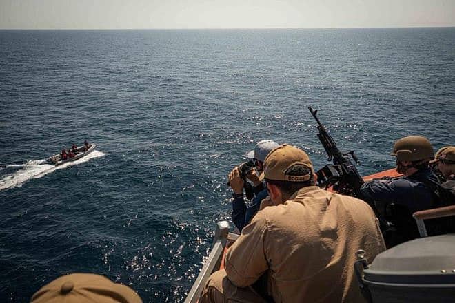 Sailors assigned to the Arleigh Burke-class guided-missile destroyer “USS Carney” respond to a simulated small-craft vessel during an anti-terrorism drill on Dec. 6, 2023. Credit: Mass Communication Specialist 2nd Class Aaron Lau/U.S. Navy.