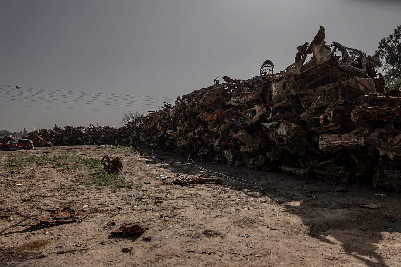 A field with destroyed cars from the Oct. 7 Hamas terrorist attacks, near the Israel-Gaza border, Jan. 22, 2024. Photo by Chen Schimmel/Flash90.