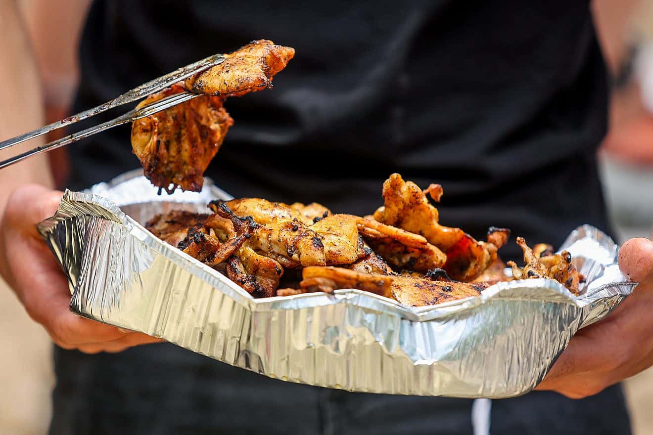 Barbecue meat prepared for Israel's 74th Independence Day celebrations in Ben Shemen Forest, May 5, 2022. Photo by Flash90.