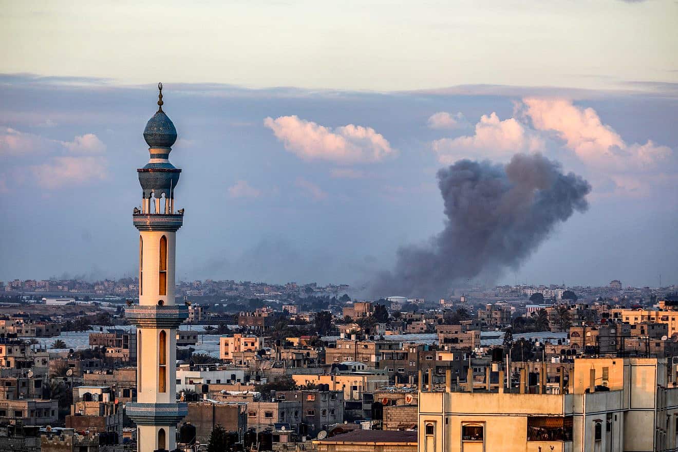 Smoke rises after Israeli airstrikes in Khan Yunis seen from Rafah, in the southern Gaza Strip, Jan. 24, 2024. Photo by Abed Rahim Khatib/Flash90.