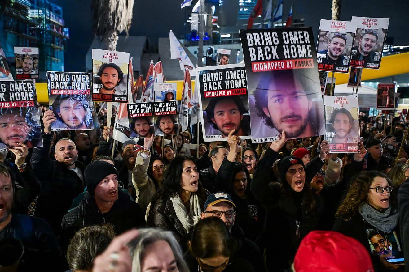 People attend a rally calling for the release of Israelis held hostage by Hamas terrorists in Gaza at "Hostage Square" in Tel Aviv, Jan. 27, 2024. Photo by Avshalom Sassoni/Flash90.