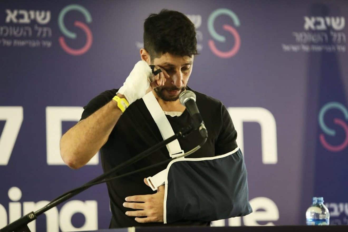 Israeli actor Idan Amedi talks to reporters upon being released from Sheba Medical Center in Ramat Gan, Jan. 25, 2024. Photo by Gideon Markowicz/TPS.