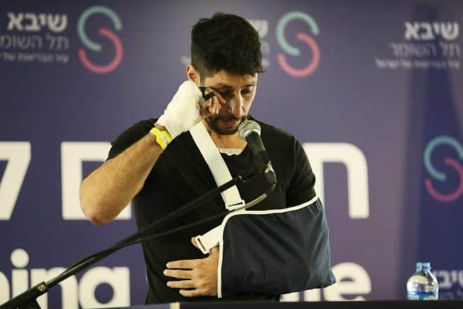 Israeli actor Idan Amedi talks to reporters upon being released from Sheba Medical Center in Ramat Gan, Jan. 25, 2024. Photo by Gideon Markowicz/TPS.