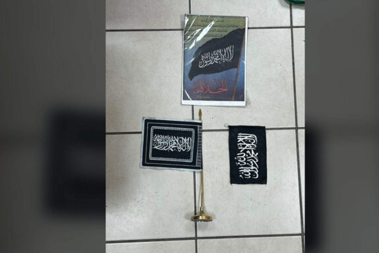 Islamic State flags found in the homes of two eastern Jerusalem residents arrested on suspicion of plotting a major terror attack in the city. Credit: Israel Police Spokesperson.