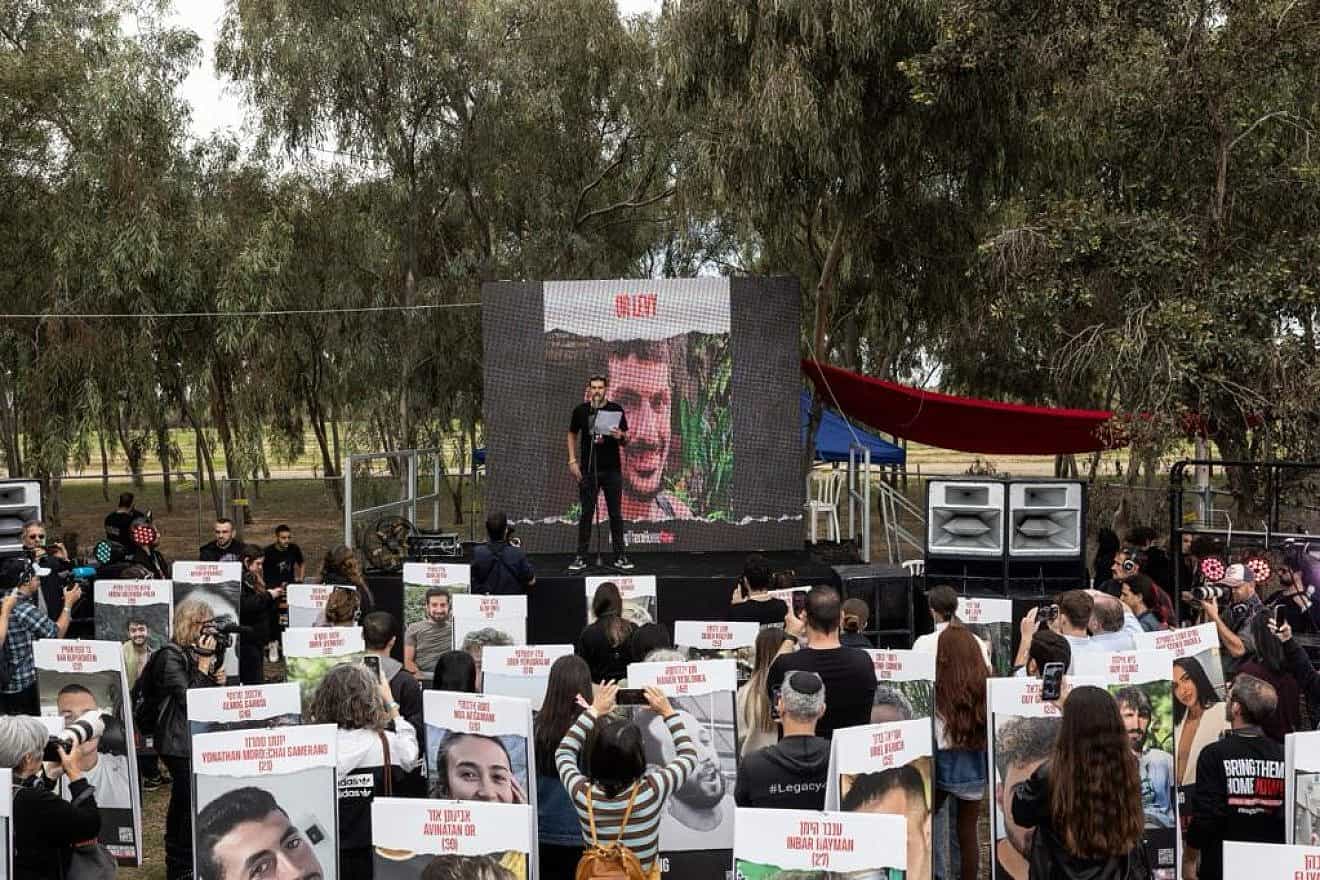 Michael Levy, whose brother, Or Levy, is being held by Hamas in Gaza, speaks at a memorial ceremony at the site of the Supernova music festival near Kibbutz Re'im on Jan. 5, 2024. Credit: Courtesy of the Hostages and Missing Families Forum HQ.