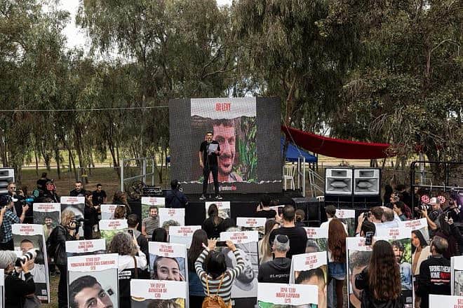 Michael Levy, whose brother, Or Levy, is being held by Hamas in Gaza, speaks at a memorial ceremony at the site of the Supernova music festival near Kibbutz Re'im on Jan. 5, 2024. Credit: Courtesy of the Hostages and Missing Families Forum HQ.
