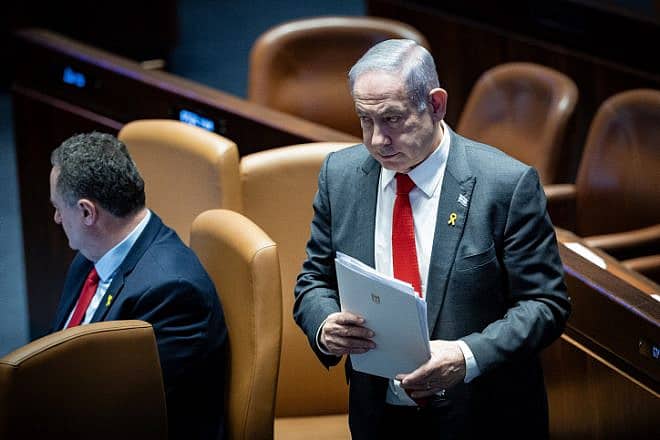 Prime Minister Benjamin Netanyahu approaches the podium during a plenum session for the Knesset's 75th birthday, Jan. 24, 2024. Photo by Yonatan Sindel/Flash90.