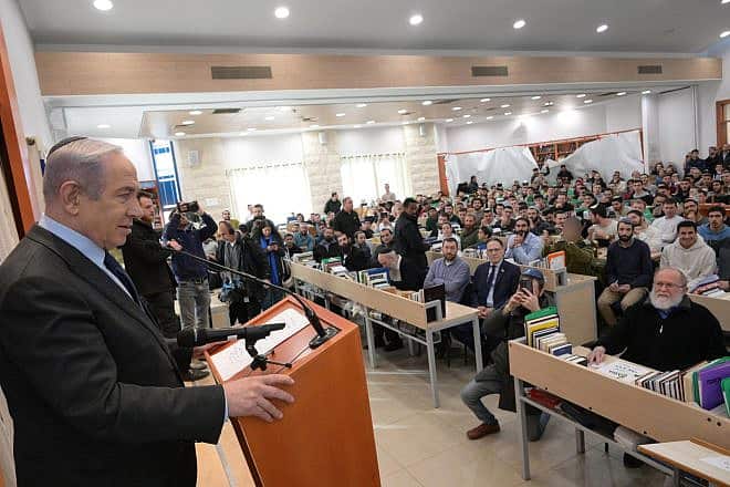 Israeli Prime Minister Benjamin Netanyahu visits the Bnei David pre-military academy in Eli in the Binyamin region of Samaria, Jan. 30, 2024. Photo by Amos Ben-Gershom/GPO.
