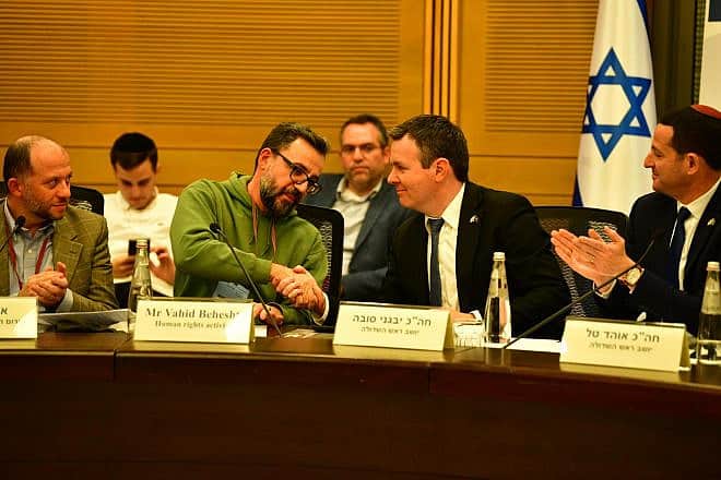 Iranian dissident Vahid Beheshti (left) and Israeli lawmaker Evgeny Sova, co-chairman of the Knesset Israel Victory Caucus, at the parliament in Jerusalem, Jan. 2, 2024. Photo by Michael Katz.