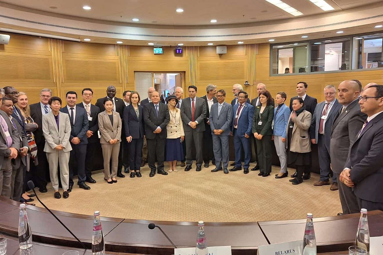 MKs Danny Danon (center, wearing red tie) and Ram Ben Barak (behind Danon's left shoulder) meet with foreign diplomats at the Knesset to discuss post-war Gaza, Jan. 10, 2024. Credit: The Knesset Spokespersons Office.