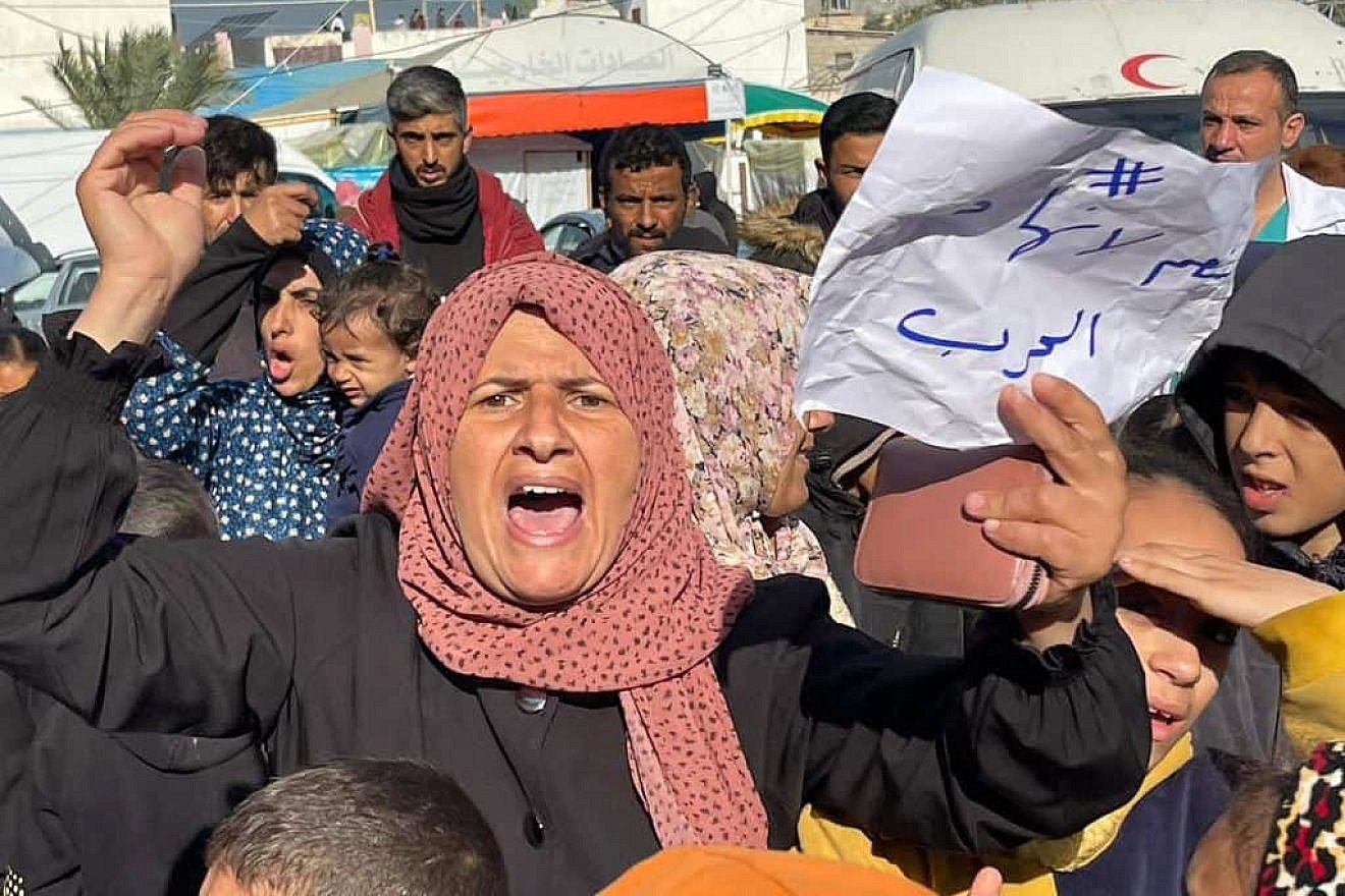 An anti-Hamas demonstration near the Al Aqsa hospital in Deir al-Balah in the central Gaza Strip, on Jan. 24, 2024. The signs read "We are fed up" and "Free the kidnapped." Photo by Majdi Fathi/TPS.