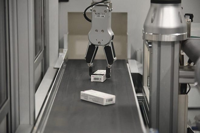 Medicines on a conveyor belt at Jerusalem's Shaare Zedek Medical Center on Aug. 2, 2023. Photo by Yoav Dudkevitch/TPS.
