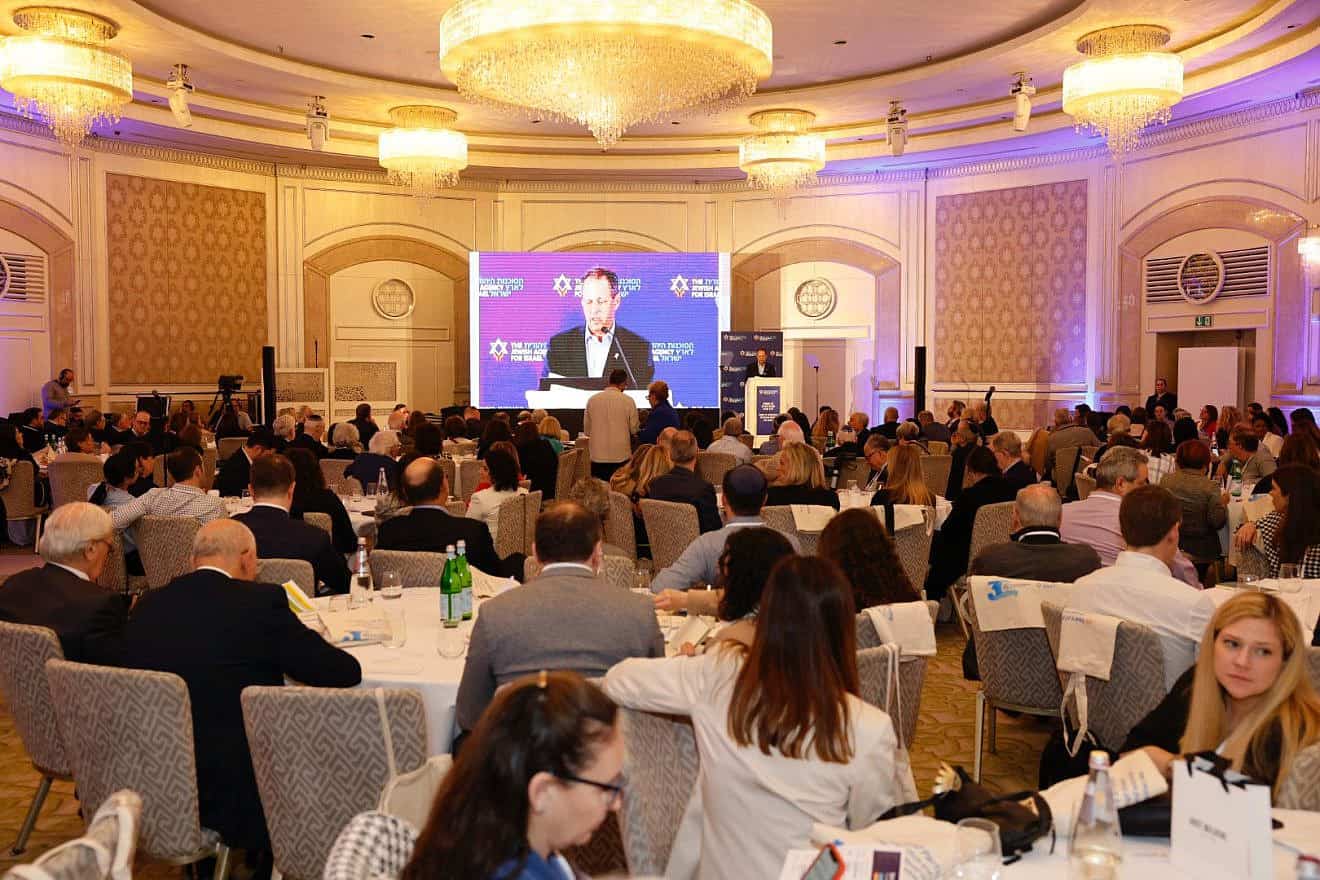 Mark Wilf, chair of the Jewish Agency's board of governors, presides over their opening plenary on Sunday in Jerusalem. Photo by Guy Yechiely.