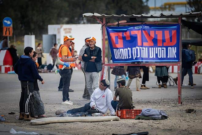 People protest against aid trucks entering Gaza at the Kerem Shalom border crossing in southern Israel on Feb. 22, 2024. Photo by Erik Marmor/Flash90.