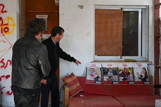 Argentinian President Javier Milei (left) and Israeli President Isaac Herzog at the home in Kibbutz Nir Oz of the Bibas family, who are still captives in Gaza, Feb. 8, 2024. Source: X.
