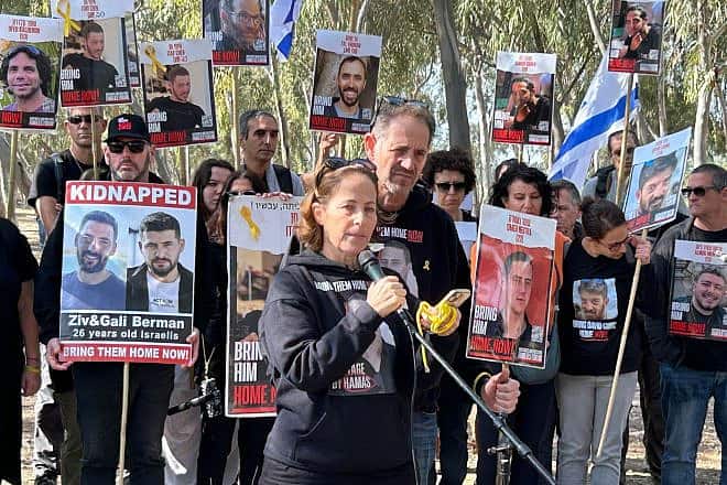 Ronen and Orna Neutra, whose son Omer is among those still being held captive by Hamas in the Gaza Strip, address the crowd at Kibbutz Re'im on Feb. 28, 2024. Credit: The Hostage and Missing Families Forum.