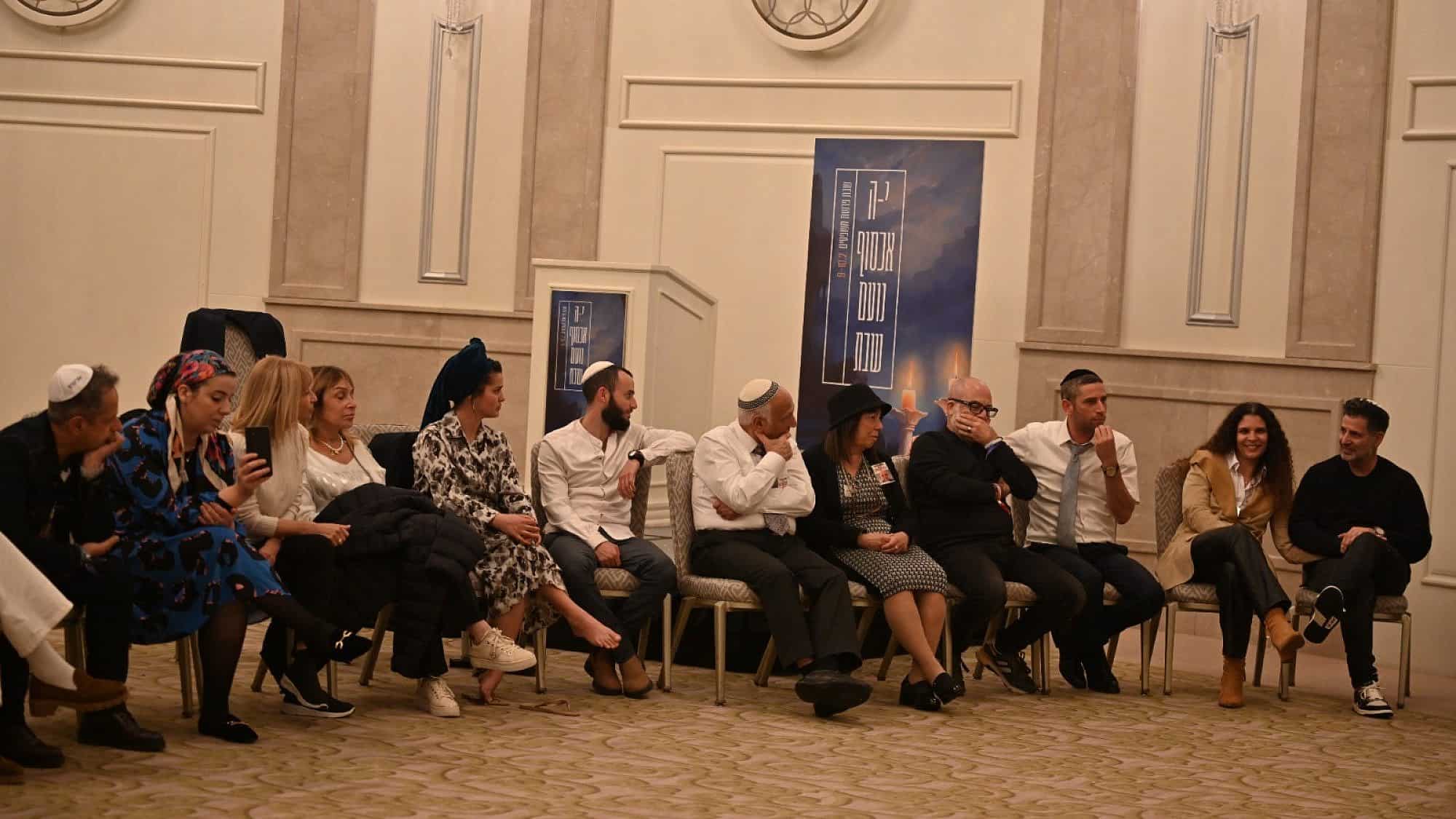 Families of captives held in Gaza and ultra-Orthodox Jews prepare for Shabbat in Jerusalem, Feb. 9, 2024. Credit: Rachel Moore.