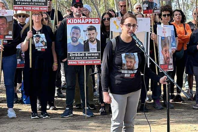 Former captive Sharon Aloni-Cunio. whose husband, David, remains in Gaza, speaks ahead of the march at Kibbutz Re'im on Feb. 28, 2024. Credit: The Hostage and Missing Families Forum.
