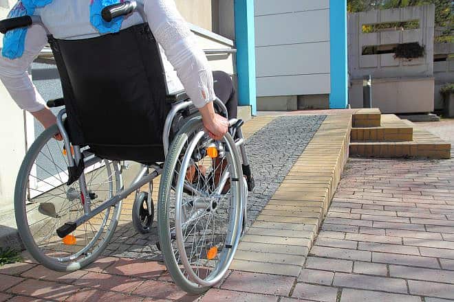 A wheelchair-accessible ramp. Credit: riopatuca/Shutterstock.