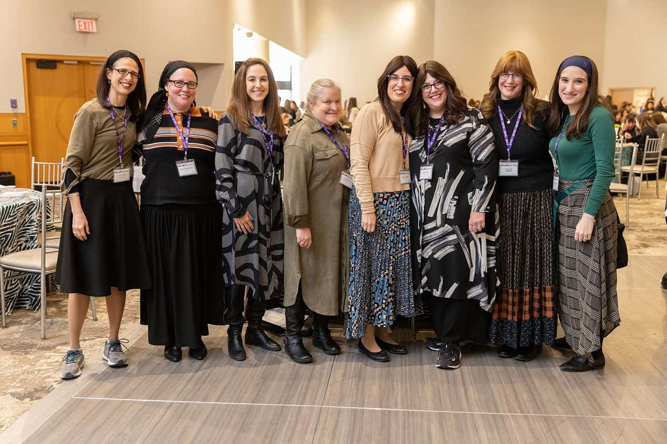 Nach Yomi participant Rebbetzin Marcy Fried, third from right, flew in to New Jersey to attend the Nach Yomi Siyum, together with six fellow participants from Dallas, Texas. Credit: Courtesy of the Orthodox Union.