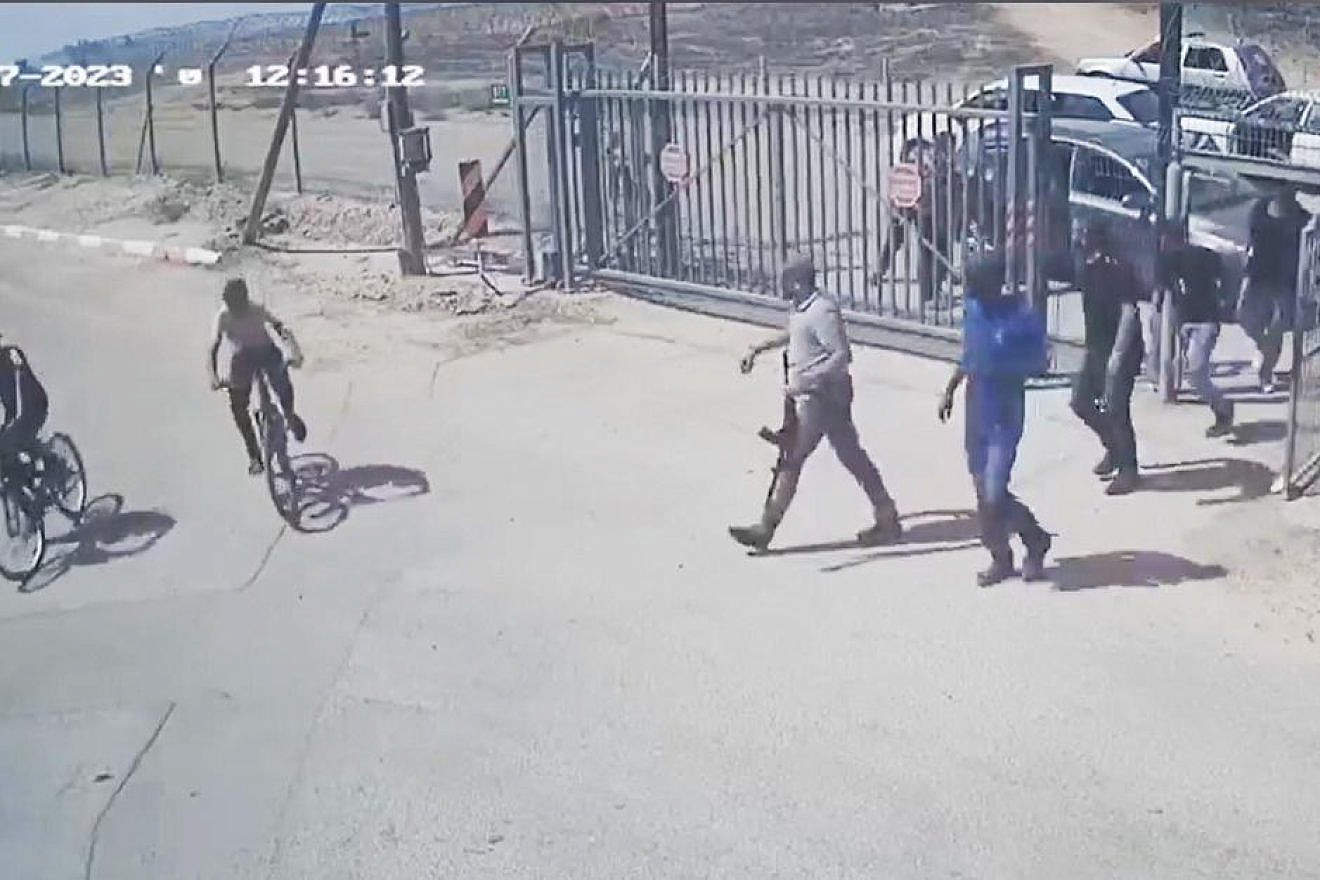 Hamas terrorists and Palestinian civilian accomplices enter Kibbutz Be'eri to murder, rape and torture Jews, on Oct. 7, 2023. Source: Kibbutz Be'eri security camera.
