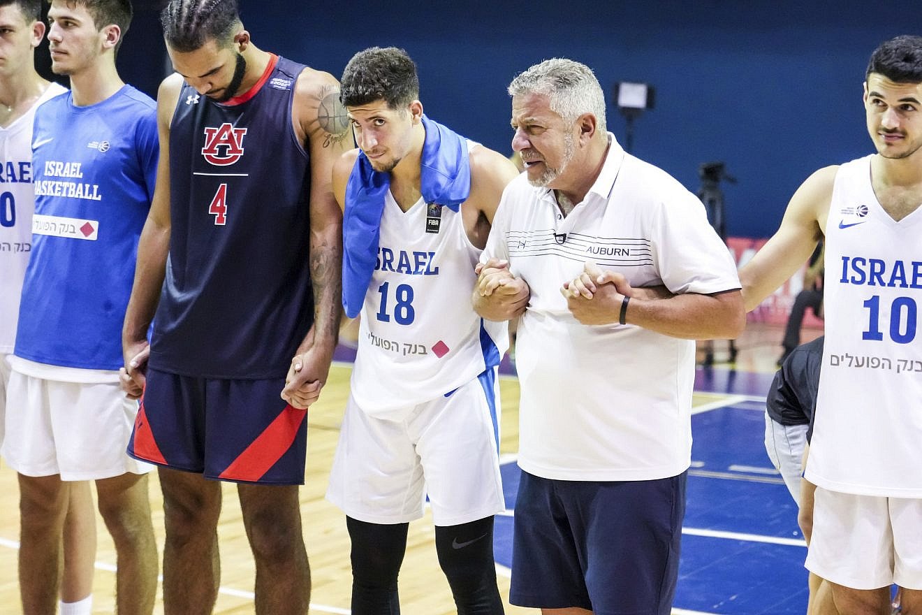 Coach Bruce Pearl with players from Auburn University and the Israel U-20 squad before their game in Israel, August 2022. Photo by Steven Leonard/Auburn Athletics.