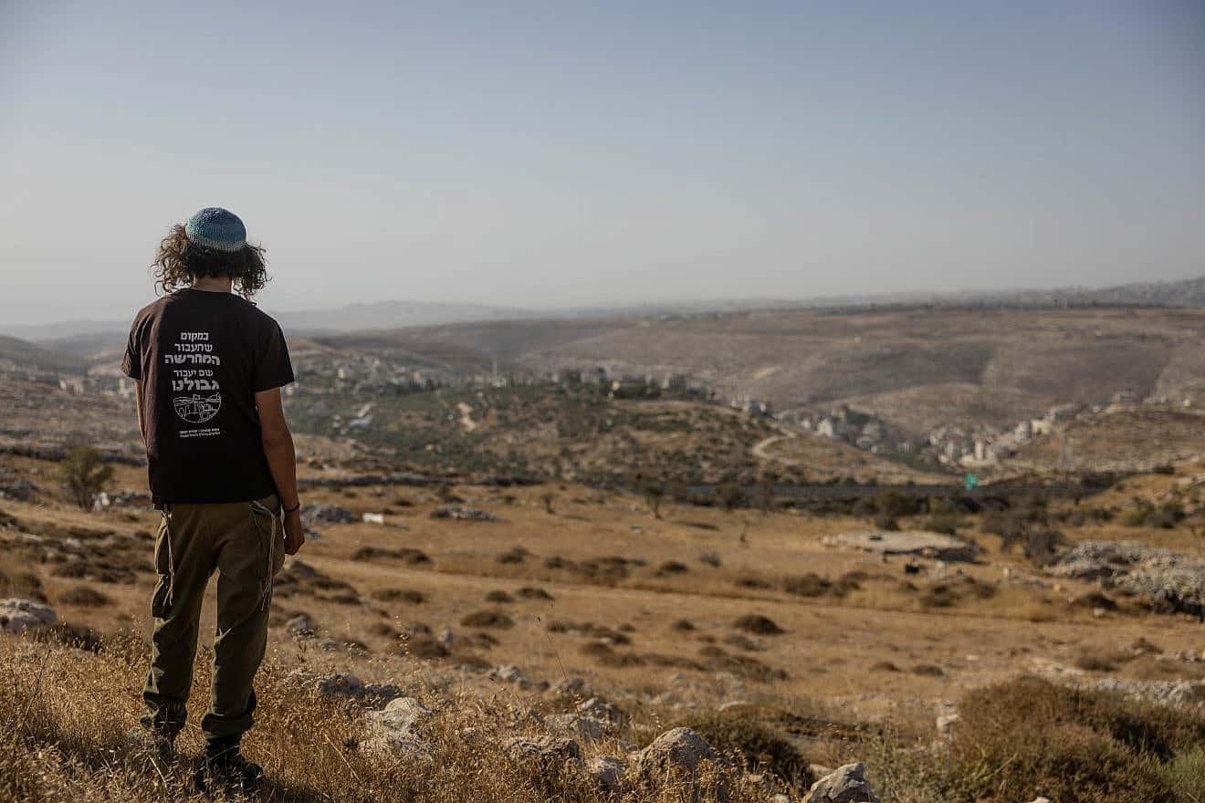A resident of the Ramat Migron outpost in the Binyamin region of Samaria, Sept. 8, 2023. Photo by Chaim Goldberg/Flash90.