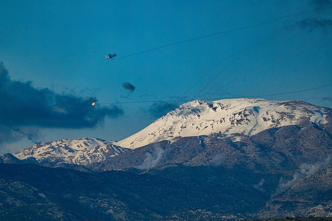 Smoke from rockets fired from Lebanon and from Israel's Iron Dome anti-missile system, near Mount Hermon, March 10, 2024. Photo by Ayal Margolin/Flash90.