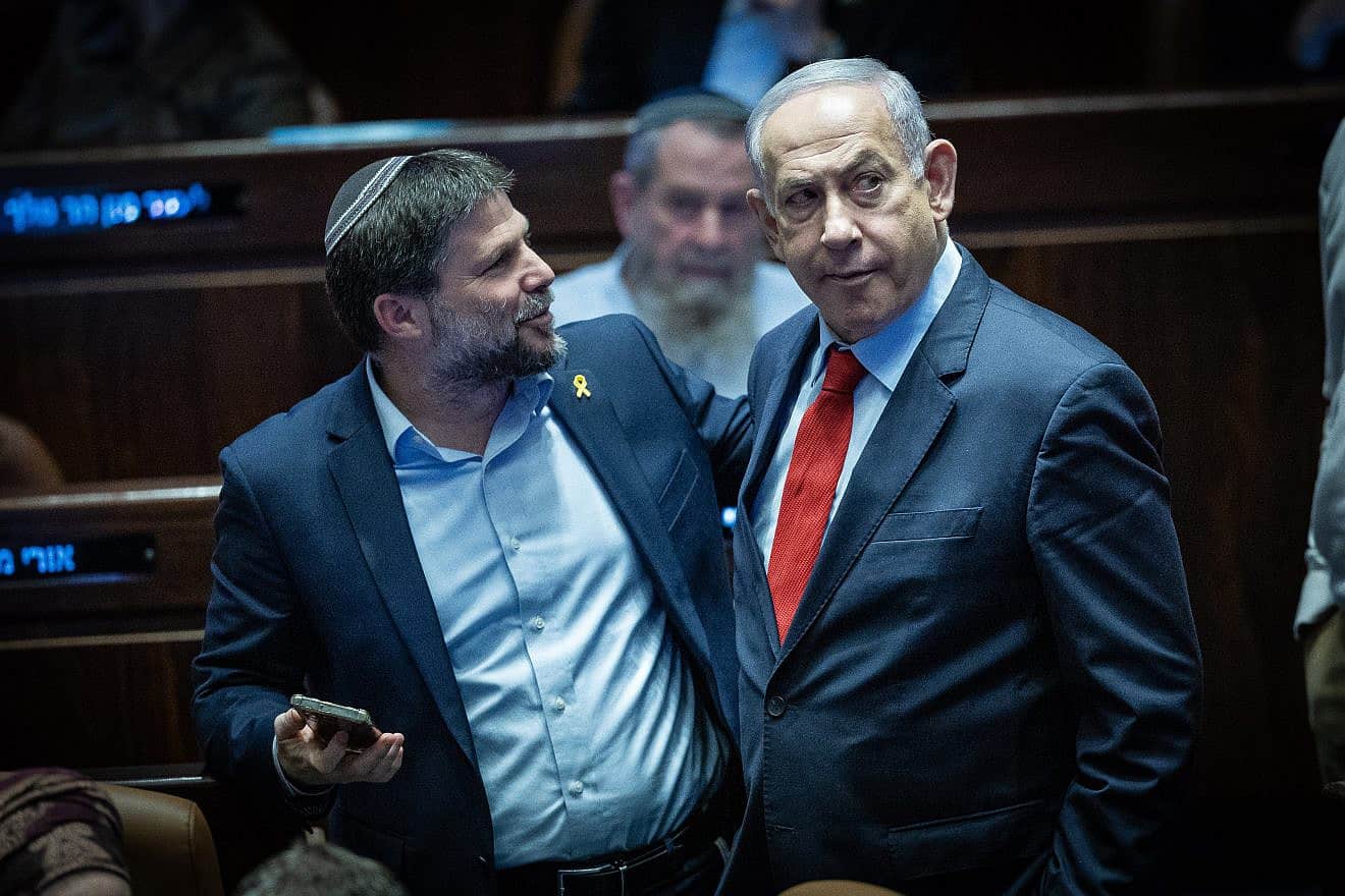 Israeli Prime Minister Benjamin Netanyahu and Israeli Finance Minister Bezalel Smotrich during a budget vote at the Knesset in Jerusalem, March 13, 2024. Photo by Yonatan Sindel/Flash90.