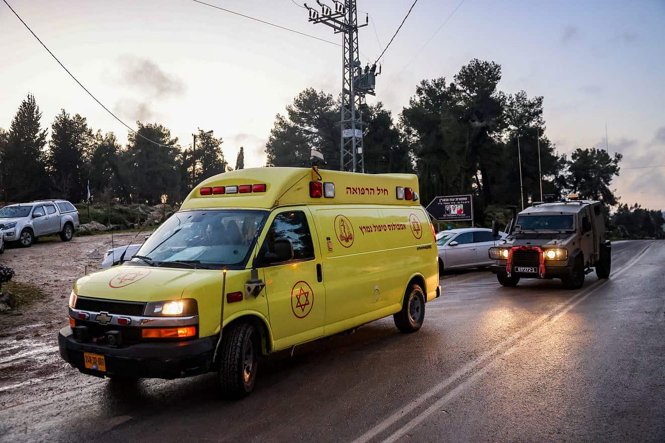 Medical and security personnel at the scene of a terrorist shooting at the Oz veGaon Nature Reserve in Judea, March 19, 2024. Photo by Chaim Goldberg/Flash90.