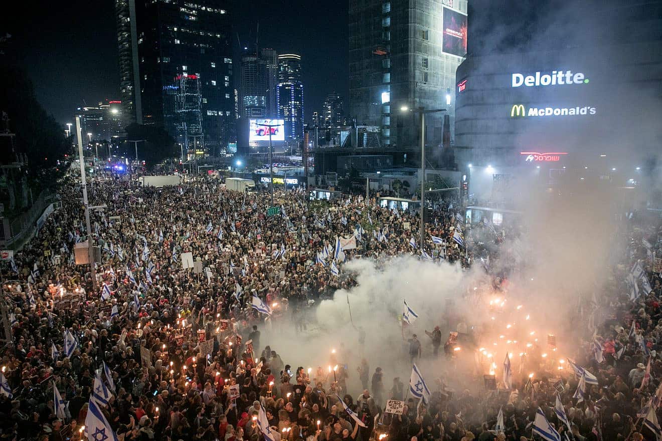 Demonstrators protest calling for the release of Israeli hostages held in the Gaza Strip and against the current Israeli government outside Hakirya Base in Tel Aviv, March 30, 2024. Photo by Miriam Alster/Flash90.