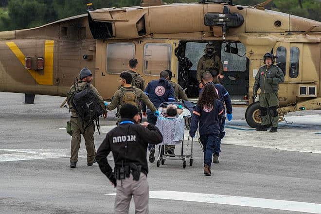An IAF helicopter evacuates Galilee residents wounded by a Hezbollah missile fired from Lebanon, Feb. 14, 2024. Photo by Ayal Margolin/Flash90.