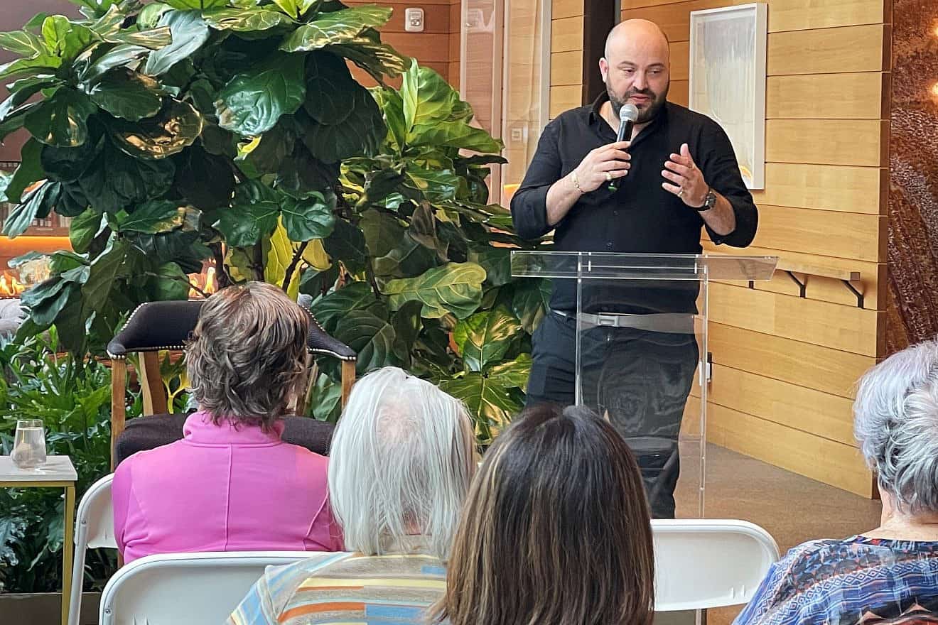 Jonny Daniels, a global humanitarian leader and media influencer, speaks to seniors on Manhattan's Upper East Side, on Feb. 27, 2024. Credit: Courtesy.