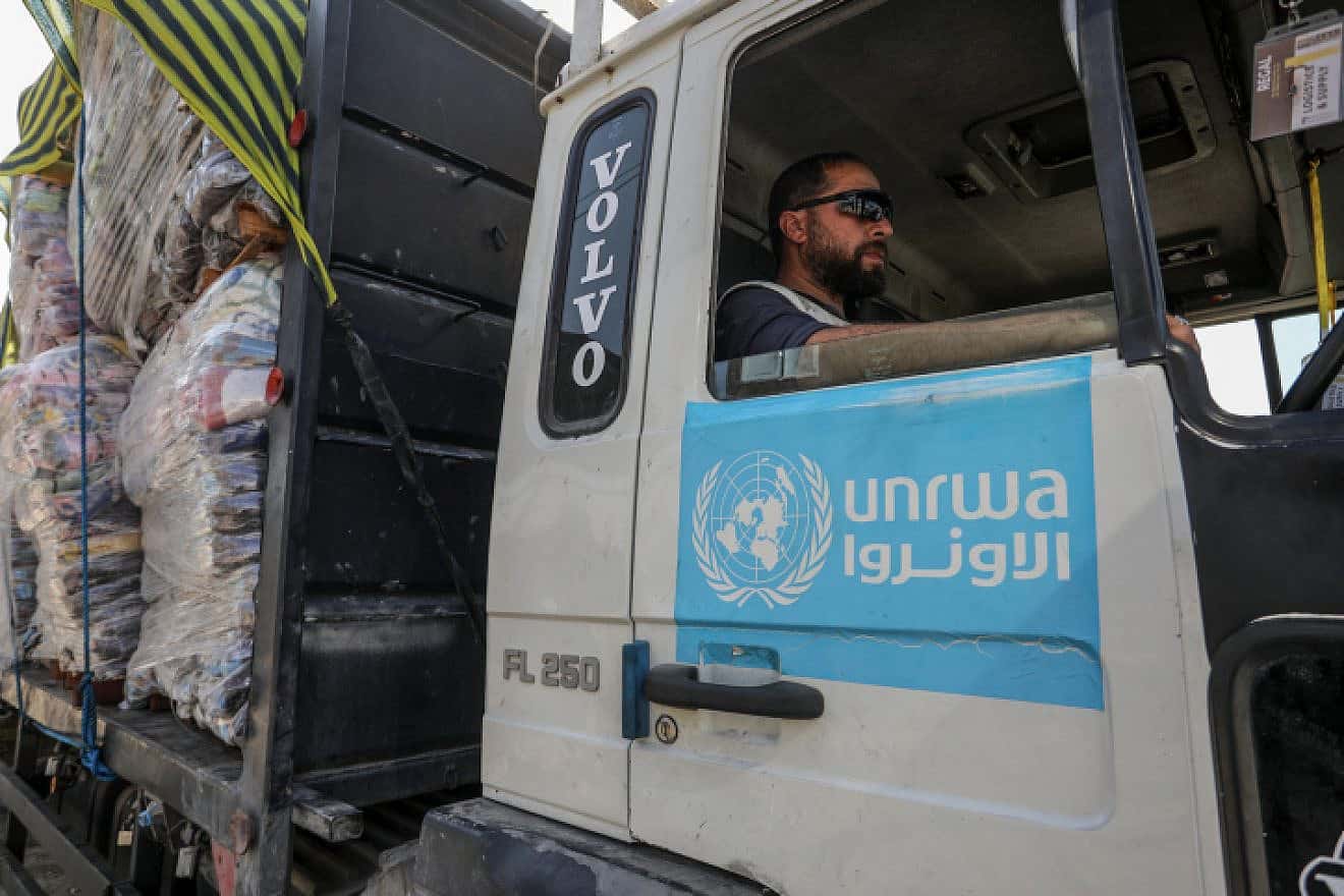 Trucks with aid arrive at the Gaza side of the Kerem Shalom border crossing, Dec. 18, 2023. Photo by Abed Rahim Khatib/Flash90.