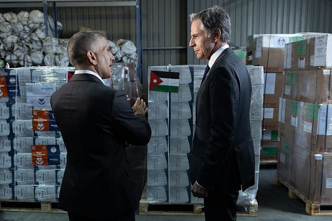 Secretary of State Antony Blinken speaks with Prince Rashid bin El Hassan at a warehouse with humanitarian aid bound for the Gaza Strip, at the Jordanian Hashemite Charity Organization in Amman, April 30, 2024. Photo by Chuck Kennedy/U.S. State Department.