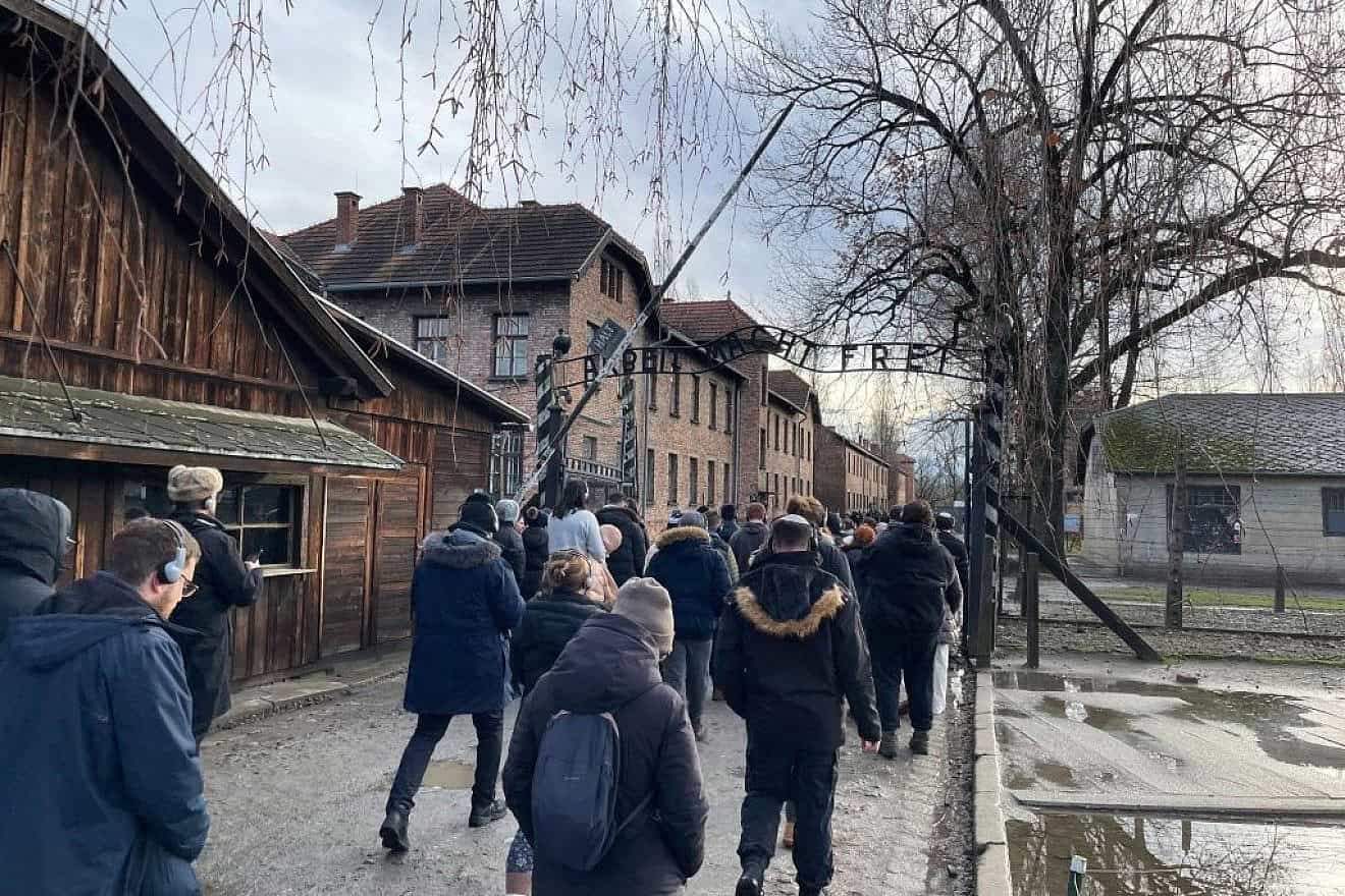 Students from Drexel University and other colleges take part in a winter mission to Poland, where they toured the grounds of the Auschwitz concentration camp, January 2024. Credit: Courtesy of Andrew Galitzer.