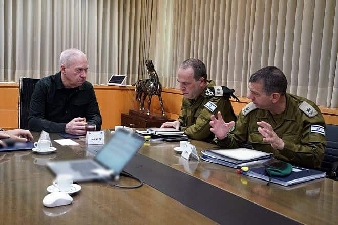 Israeli Defense Minister Yoav Gallant and two major generals discuss the Iranian threat, April 7, 2024. Photo by Ariel Hermoni/Ministry of Defense.