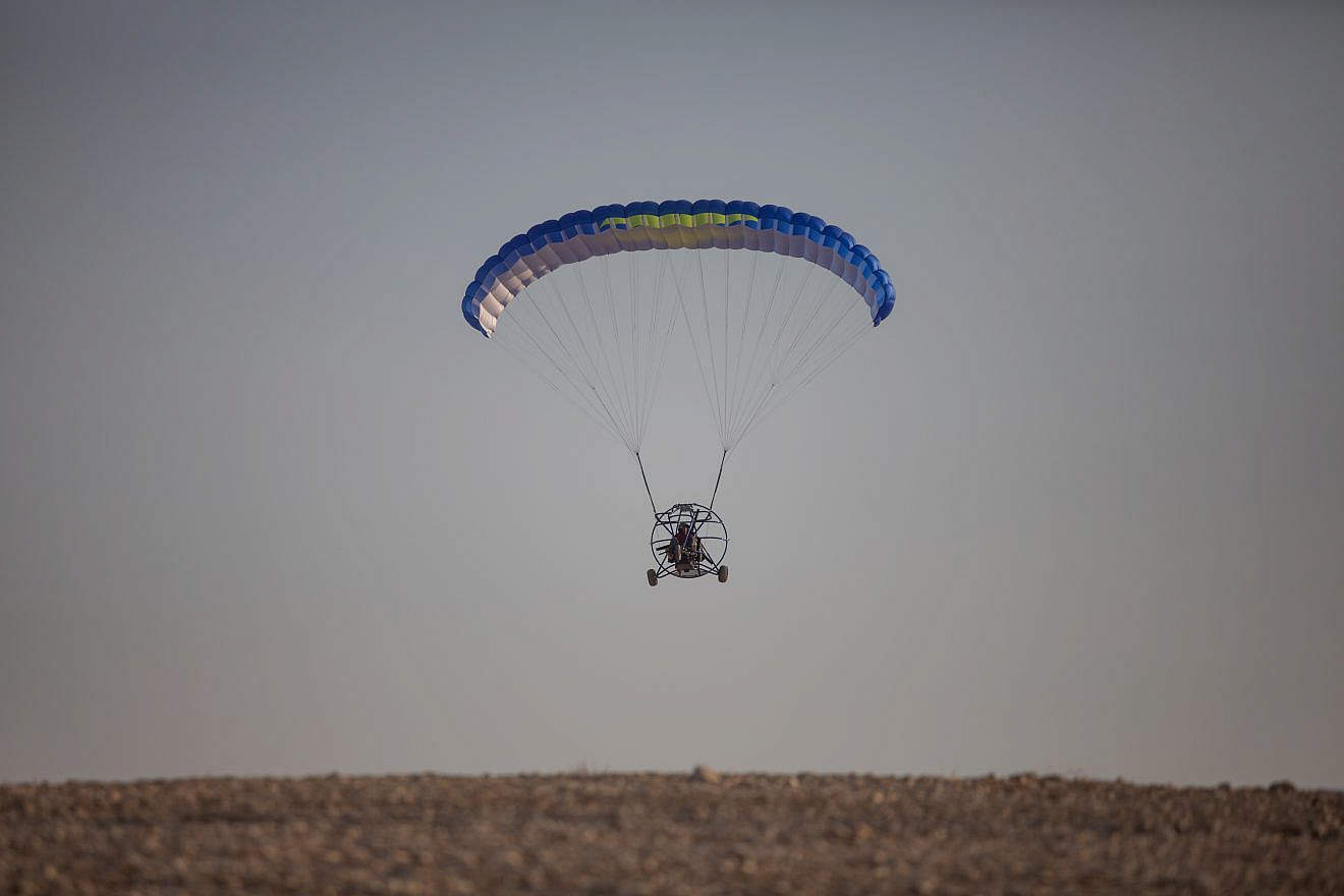 A paraglider flies near the Dead Sea in Israel, Aug. 2, 2019. Photo by Aharon Krohn/Flash90.