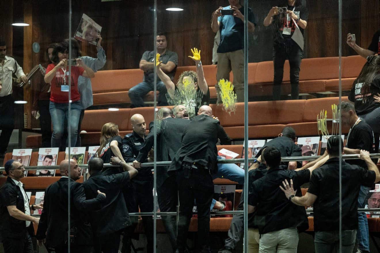 Families of Israelis held hostage in Gaza protest in the Knesset Plenum Hall in Jerusalem, April 3, 2024. Photo by Yonatan Sindel/Flash90.