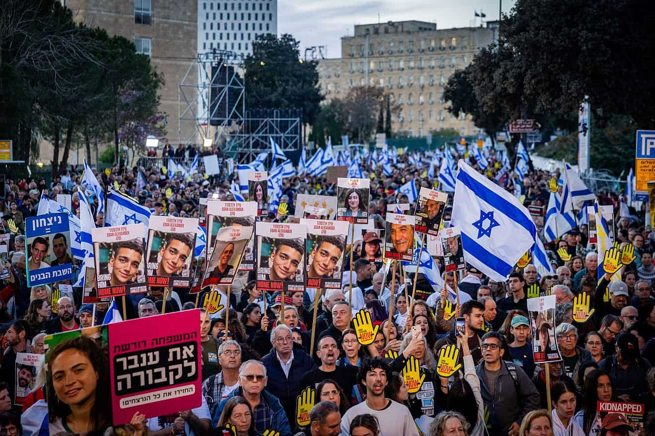 Thousands of Israelis take part in a rally marking six months since the Hamas Oct. 7 massacre, outside the Israeli parliament in Jerusalem, April 7, 2024. Photo by Yonatan Sindel/Flash90.
