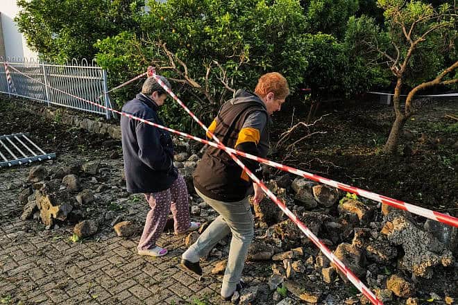 Israelis check the damage to their home from the previous night's Iranian missile attack in Katzrin, the Golan Heights, April 14, 2024. Photo by Michael Giladi/ Flash90.