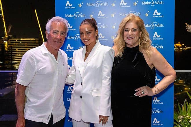 In Tel Aviv are, from left, philanthropist Sylvan Adams, singer-songwriter Noa Kirel and Make-A-Wish Israel founder Denise Bar-Aharon, March 31, 2024. Photo by Shauli Lendler.
