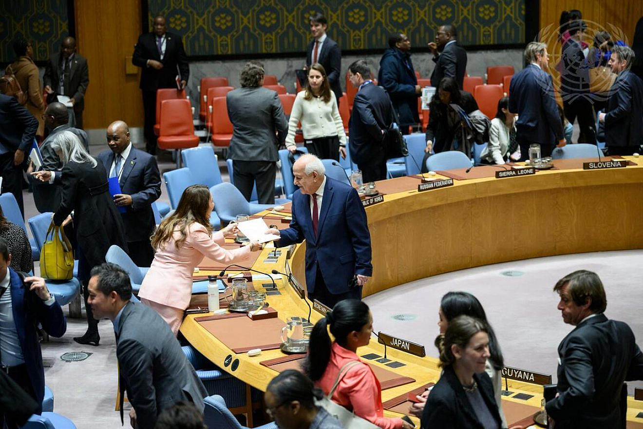 Vanessa Frazier (in pink), permanent representative of Malta to the United Nations and president of the U.N. Security Council for the month of April, speaks with Riyad Mansour, permanent observer of the State of Palestine to the United Nations, ahead of the Security Council meeting on the admission of new members on April 8, 2024. Credit: Loey Felipe/U.N. Photo.