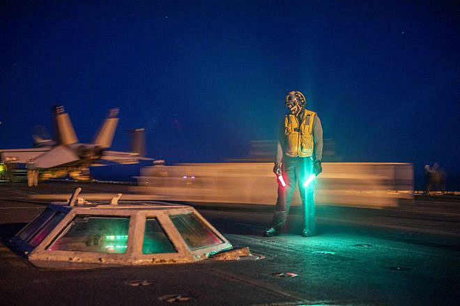 A sailor participates in flight operations aboard the “USS Dwight D. Eisenhower,” a Nimitz-class aircraft carrier, in the Red Sea, April 18, 2024. Credit: Navy Petty Officer 3rd Class Samantha Alaman/U.S. Navy.