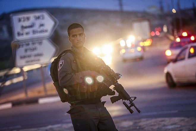 An Israel Defense Forces soldier in the South Hebron Hills, April 2, 2015. Photo by Nati Shohat/Flash90.