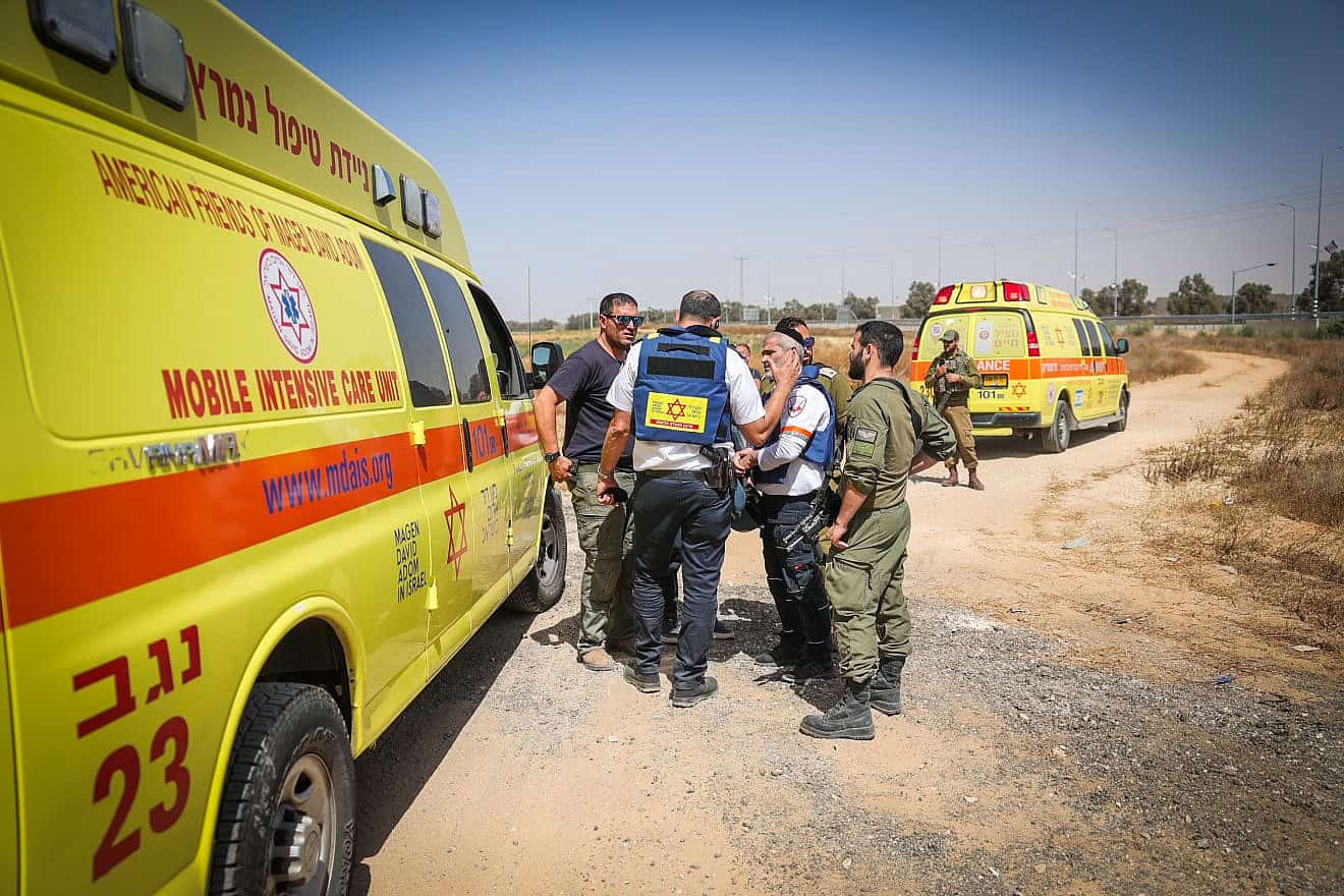 Israeli security and rescue forces at the scene of a mortar attack near the Kerem Shalom Crossing to the Gaza Strip, May 5, 2024. Credit: Flash90.