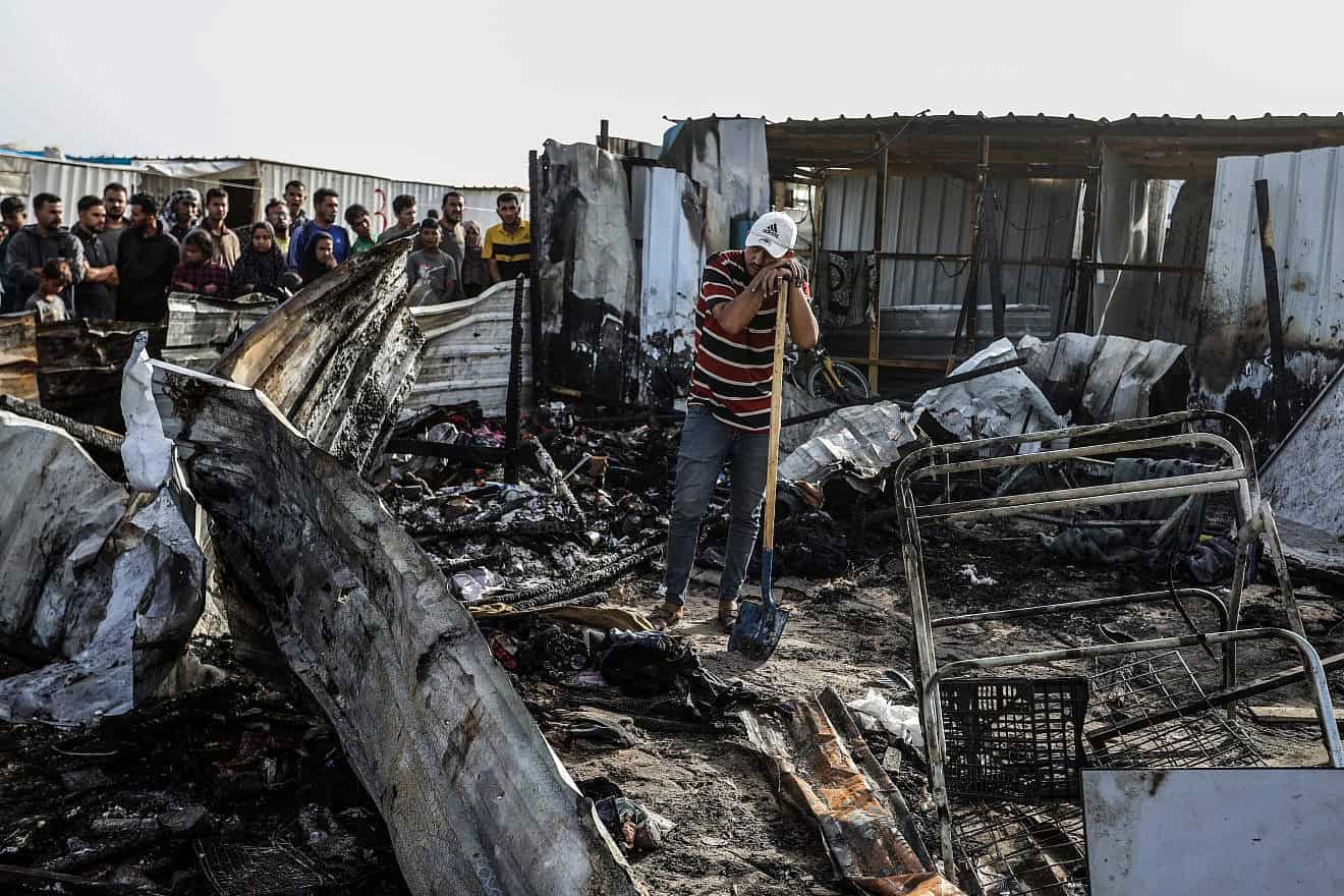 Palestinians inspect damage after an Israeli airstrike west of Rafah in the southern Gaza Strip, May 27, 2024. Photo by Abed Rahim Khatib/Flash90.